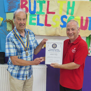 (L-R)  Past President Robert Evans, presenting the award to Richard Morgan, Group Chair, 1st Builth Wells Scout Group