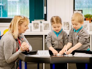 Supporting image for story: New lessons in learning as schools teach pupils in class and at home