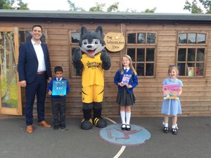 Mr Francis and pupils celebrating with Wolfie! 