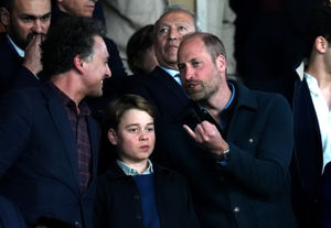 The Prince of Wales and Prince George in the stands during the UEFA Champions League quarter final