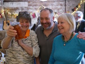 Judge Jane Maggs with Gareth Clark and Pam Peek of Kington Chamber of Trade enjoying the second marmalade competition. Image by Andy Compton