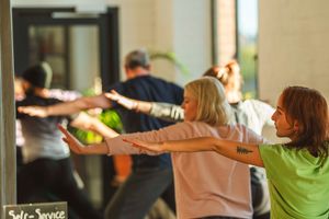 A yoga class in a coffee shop, run by local business Earthed Wisdom. Picture: Aaron Child