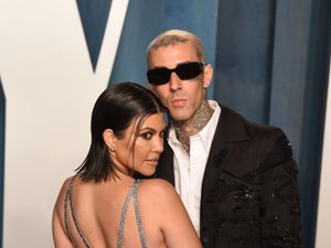 Supporting image for story: Travis Barker pictured being taken to hospital following medical issue