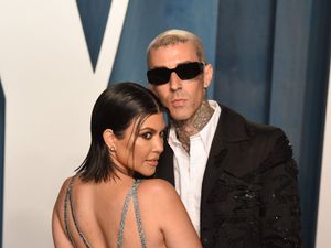 Supporting image for story: Travis Barker pictured being taken to hospital following medical issue