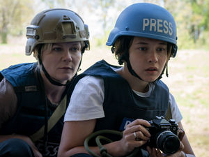 Supporting image for story: Film Talk: Kirsten Dunst leads the action in Civil War 