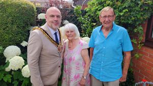 The Mayor with Rose & Alf in their garden. 