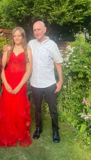 Angel with her dad before her prom. Steven was a fit and healthy 56-year-old. 