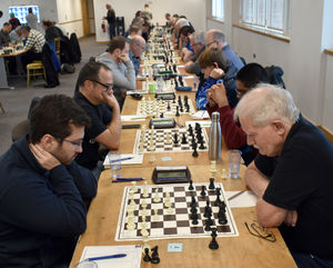 Eyes down for players in the Major section.