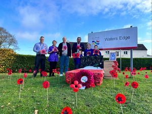 Pupils from Landywood Primary School delivered handcrafted poppies to Waters Edge Care Home
