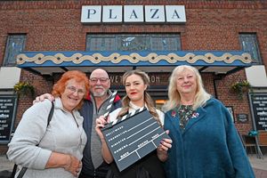 Cynthia and Roger Woodworth, duty manager  Charlotte Gibson and Sandra Turner, chair of the Lanor society, welcome people to the Plaza's 90th anniversary event