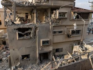 A view of a damaged home after projectiles fired from Lebanon targeted Tira