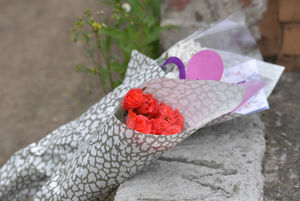 Flowers have been left at the scene of the fire