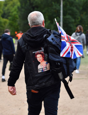 A rucksack decorated with a picture of Her Majesty. 