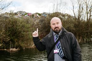 Express & Star reporter James Vukmirovic holds his breath as he points out the size of the pile
