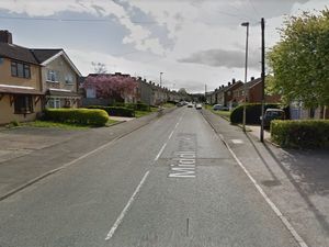 Supporting image for story: Arrest after woman's body found at Dudley housing complex