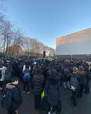 Ste Hamilton giving away the gifts to students at Holyhead School in Handsworth
