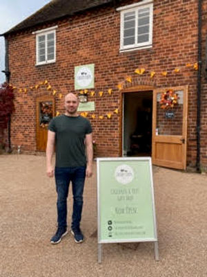 Matt outside his new shop