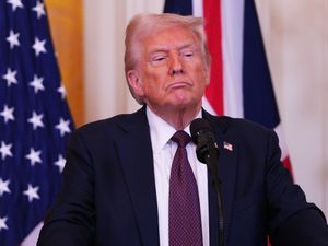 US President Donald Trump in front of the US and Union flags in the White House after meeting Prime Minister Sir Keir Starmer