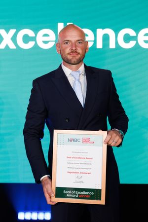Chris Bennett with the NHBC Seal of Excellence he won recently