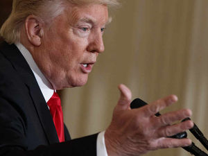 Supporting image for story: Donald Trump travel ban: Where do you stand? Should the president's UK state visit be cancelled? Vote now in our poll