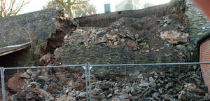 Portions of Ludlow Town Walls fell down during the night crushing a vehicle parked next to them in February 2013