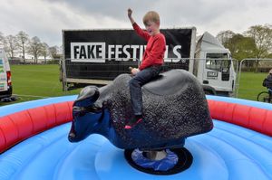 Benjamin Leversedge, 9, rides the bull