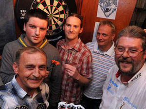 Supporting image for story: Regulars step up to oche for game with darts ace