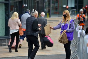 Facemasks being handed out at Wolverhampton Railway Station