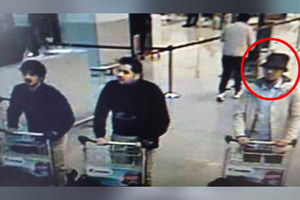 These three men are believed to be connected with the airport attack and the man circled is thought to be on the run