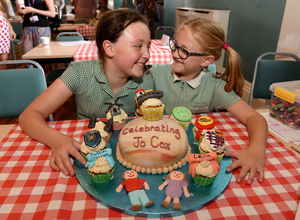 Matilda Sambrook and Libby Hinton with their cake