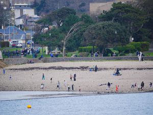 People enjoy the warm weather at Clevedon Marine Lake