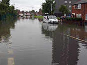 Supporting image for story: Rain brings flood chaos