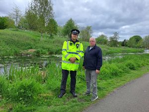 Sergeant 3383 Jones met with Councillor Peter Scott to discuss the killing of two swans in Victoria Park last week. Picture: Telford & Wrekin Police.