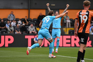 Aaron Pressley celebrates his first goal for Walsall after doubling their lead.