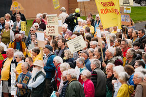 Campaigners have marched in Bishop's Castle calling for health bosses to re-open inpatient beds at their hospital.
