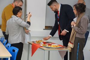 The judging panel taste the creations.
