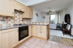 The kitchen is modern and spacious