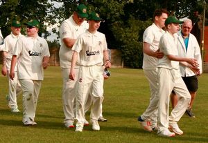 The Foxes youth walking off on Calverhall Cricket Club ground.