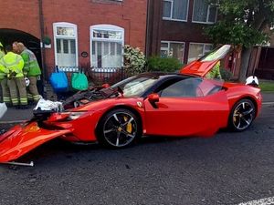 Supporting image for story: Still no sign of Ferrari driver two days after hypercar ploughed into parked cars