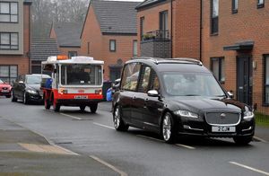 The funeral procession in Woodside