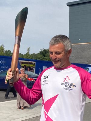 Stuart Richards carries the baton through Southwater  