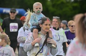 Almost 400 people took part in the colour run event to raise money and remember those lost