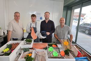 L-R: Shane Birch-Bastock of Brierley Hill Community Forum, fishmonger Matt Witts, Cllr Adam Davies and Cllr Wayne Little at MW Seafoods Brierley Hill Market