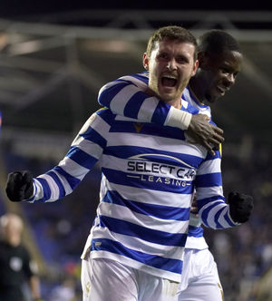 Readingâs John Swift celebrates scoring their side's second goal of the game with team-mate Lucas Joao (right) during the Sky Bet Championship match at the Select Car Leasing Stadium, Reading. Picture date: Tuesday February 22, 2022..