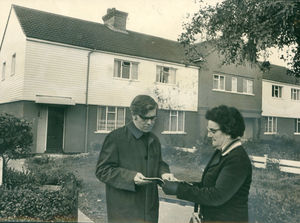 Councillor Tom Larkin, vice chairman of the housing committee, and Councillor Mary Pointon, chairman, outside some of the completed houses in Low Hill during a tour of inspection in September, 1972.