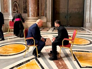 Ukrainian President Volodymyr Zelensky and US President Donald Trump talk as they attend the funeral of Pope Francis in the Vatican