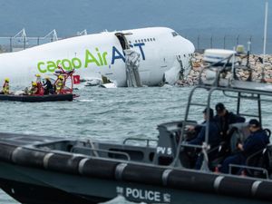 Supporting image for story: Two killed after plane falls into sea off Hong Kong runway