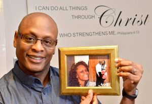 Errol Richards 54 (Works at RICOH in Telford, hence Shropshire Star too), he and work colleagues are fundraising for his daughter Anntoinette Richards to have experimental treatment to fight cancer. He holds a pic of her and of them together..