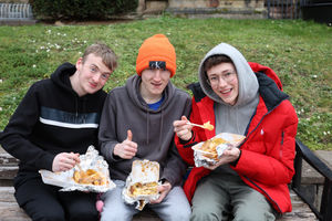 Archie Povey, Bill Bellamy and Lewis Rochelle customers from Cannock with jacket potatoes.