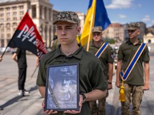 Supporting image for story: Ukrainian troops pay last respects to Briton killed in clash with Russian forces